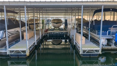 Tastefully updated and beautifully decorated condo at the on Seasons Ridge At Four Seasons in Missouri - for sale on GolfHomes.com, golf home, golf lot