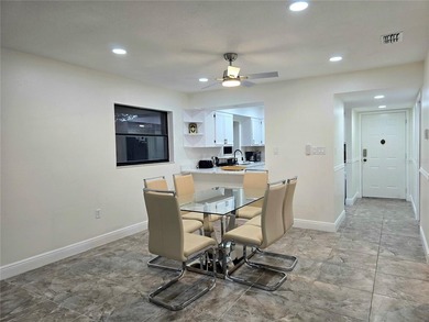 Enjoy Florida's lifestyle at its best in this renovated top on Countryside Country Club in Florida - for sale on GolfHomes.com, golf home, golf lot