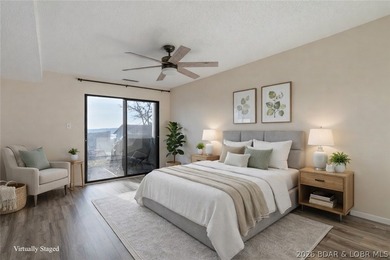 Tastefully updated and beautifully decorated condo at the on Seasons Ridge At Four Seasons in Missouri - for sale on GolfHomes.com, golf home, golf lot