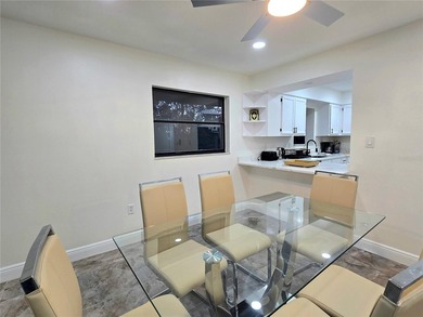 Enjoy Florida's lifestyle at its best in this renovated top on Countryside Country Club in Florida - for sale on GolfHomes.com, golf home, golf lot