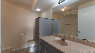 Tastefully updated and beautifully decorated condo at the on Seasons Ridge At Four Seasons in Missouri - for sale on GolfHomes.com, golf home, golf lot