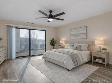 Tastefully updated and beautifully decorated condo at the on Seasons Ridge At Four Seasons in Missouri - for sale on GolfHomes.com, golf home, golf lot