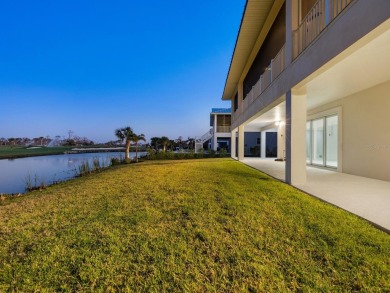 Custom home with fairway and water views! As you drive south on on Lemon Bay Golf Club in Florida - for sale on GolfHomes.com, golf home, golf lot