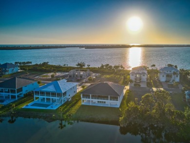 Custom home with fairway and water views! As you drive south on on Lemon Bay Golf Club in Florida - for sale on GolfHomes.com, golf home, golf lot