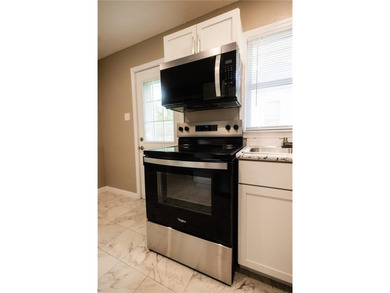 Completely updated 4 Bed 2 Bath Home Located Within View of the on Moila Country Club in Missouri - for sale on GolfHomes.com, golf home, golf lot