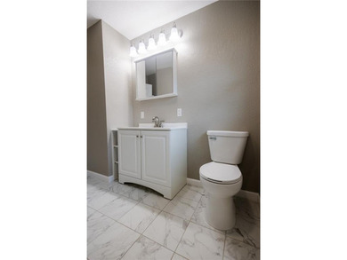 Completely updated 4 Bed 2 Bath Home Located Within View of the on Moila Country Club in Missouri - for sale on GolfHomes.com, golf home, golf lot