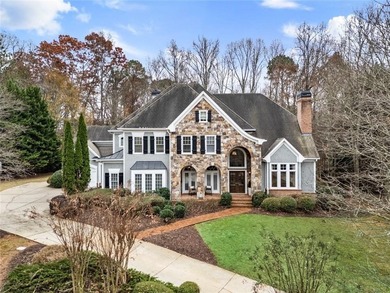 Set on a premium 1.59+ acre lot in the prestigious Manor Golf & on Manor Golf and Country Club in Georgia - for sale on GolfHomes.com, golf home, golf lot
