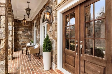 Set on a premium 1.59+ acre lot in the prestigious Manor Golf & on Manor Golf and Country Club in Georgia - for sale on GolfHomes.com, golf home, golf lot