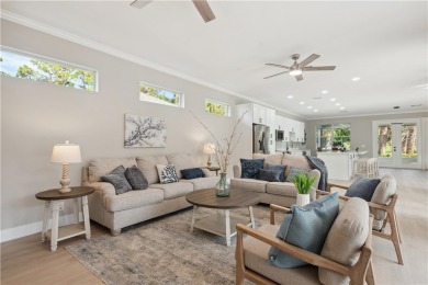 This completely renovated home sits directly on the golf course on Indian River Club in Florida - for sale on GolfHomes.com, golf home, golf lot