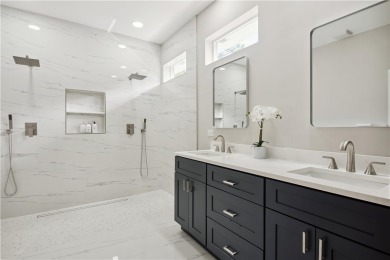 This completely renovated home sits directly on the golf course on Indian River Club in Florida - for sale on GolfHomes.com, golf home, golf lot