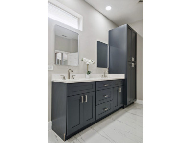 This completely renovated home sits directly on the golf course on Indian River Club in Florida - for sale on GolfHomes.com, golf home, golf lot