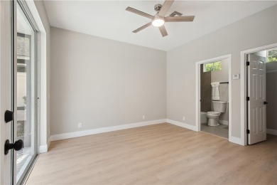 This completely renovated home sits directly on the golf course on Indian River Club in Florida - for sale on GolfHomes.com, golf home, golf lot