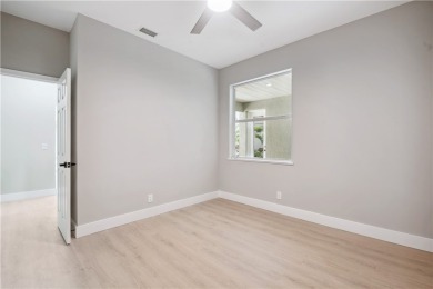 This completely renovated home sits directly on the golf course on Indian River Club in Florida - for sale on GolfHomes.com, golf home, golf lot