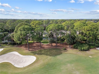 This completely renovated home sits directly on the golf course on Indian River Club in Florida - for sale on GolfHomes.com, golf home, golf lot
