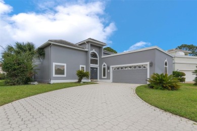 Stunning 3-Bedroom, 3-Bath Luxury Home in the Prestigious on Plantation Bay Golf and Country Club in Florida - for sale on GolfHomes.com, golf home, golf lot