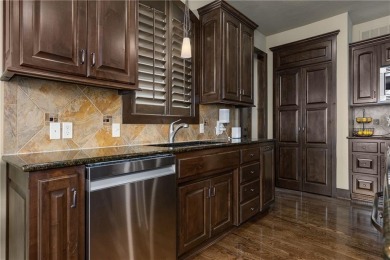 This 2-story home in Chapel Hill sits on a large cul-de-sac lot on Heritage Park Golf Course in Kansas - for sale on GolfHomes.com, golf home, golf lot