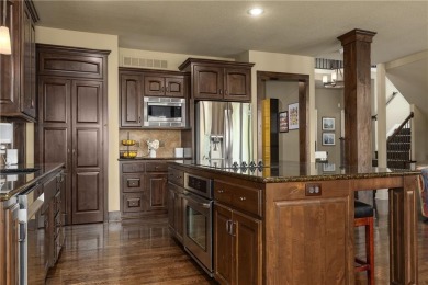 This 2-story home in Chapel Hill sits on a large cul-de-sac lot on Heritage Park Golf Course in Kansas - for sale on GolfHomes.com, golf home, golf lot