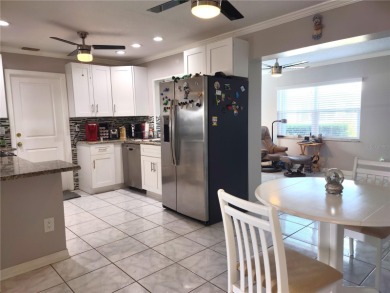Under contract-accepting backup offersPLETELY UPDATED! MOVE-IN on Mainlands Golf Club in Florida - for sale on GolfHomes.com, golf home, golf lot