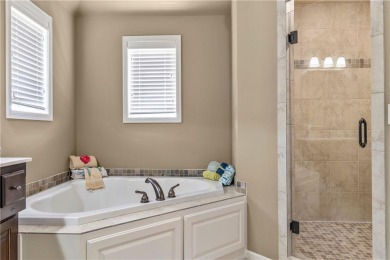 This 2-story home in Chapel Hill sits on a large cul-de-sac lot on Heritage Park Golf Course in Kansas - for sale on GolfHomes.com, golf home, golf lot