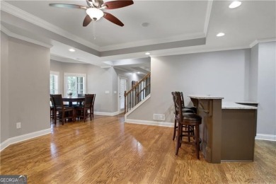 Enjoy Unbeatable views from Morning Coffee to Golden Hour - on Hamilton Mill Golf Club in Georgia - for sale on GolfHomes.com, golf home, golf lot