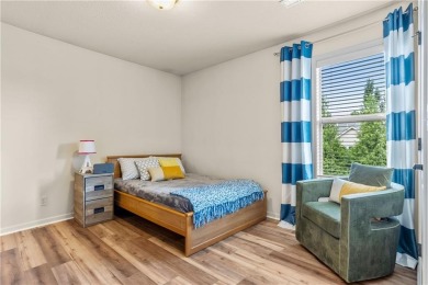 This 2-story home in Chapel Hill sits on a large cul-de-sac lot on Heritage Park Golf Course in Kansas - for sale on GolfHomes.com, golf home, golf lot