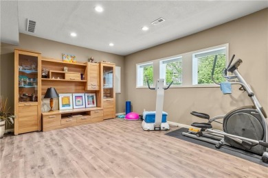 This 2-story home in Chapel Hill sits on a large cul-de-sac lot on Heritage Park Golf Course in Kansas - for sale on GolfHomes.com, golf home, golf lot