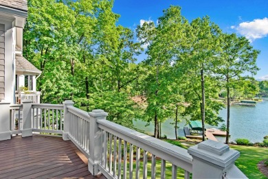 BEAUTIFUL CUSTOM HOME OFFERING UNOBSTRUCTED LAKE AND SUNSET on Reynolds Lake Oconee - The Oconee in Georgia - for sale on GolfHomes.com, golf home, golf lot