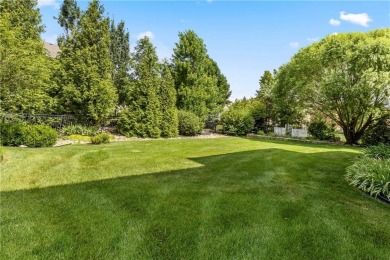 This 2-story home in Chapel Hill sits on a large cul-de-sac lot on Heritage Park Golf Course in Kansas - for sale on GolfHomes.com, golf home, golf lot