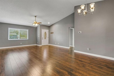 Welcome to your slice of paradise in Highland Lakes - widely on Highland Lakes Executive Golf Course in Florida - for sale on GolfHomes.com, golf home, golf lot