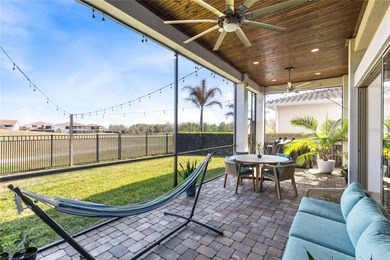 Gated golf course living with panoramic water views in Eagle on Eagle Creek Golf Club in Florida - for sale on GolfHomes.com, golf home, golf lot