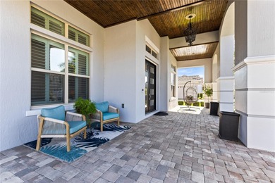 Gated golf course living with panoramic water views in Eagle on Eagle Creek Golf Club in Florida - for sale on GolfHomes.com, golf home, golf lot