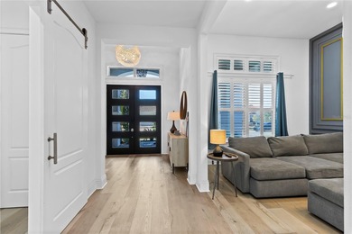 Gated golf course living with panoramic water views in Eagle on Eagle Creek Golf Club in Florida - for sale on GolfHomes.com, golf home, golf lot