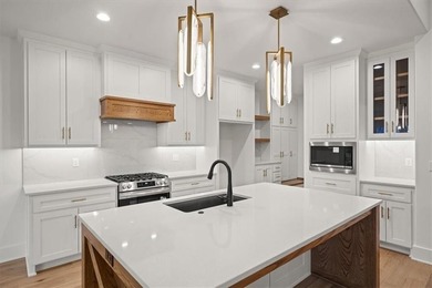 Simplify your life with an ALL NEW MAINTENANCE PROVIDED CUSTOM on Lakewood Oaks Golf Club, Ltd. in Missouri - for sale on GolfHomes.com, golf home, golf lot