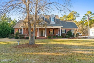 Welcome to your private paradise, perfectly positioned halfway on Carolina National Golf Club in North Carolina - for sale on GolfHomes.com, golf home, golf lot