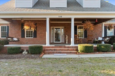 Welcome to your private paradise, perfectly positioned halfway on Carolina National Golf Club in North Carolina - for sale on GolfHomes.com, golf home, golf lot