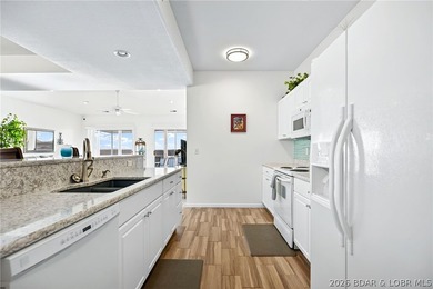 Top-floor 3 bedroom, 2 bath Palisades condo with beautiful main on Tan-Tar-A Golf Club in Missouri - for sale on GolfHomes.com, golf home, golf lot