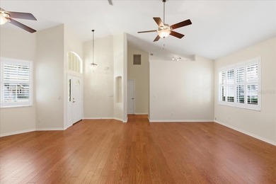 Located within the guard-gated River Hills Golf & Country Club on River Hills Country Club in Florida - for sale on GolfHomes.com, golf home, golf lot