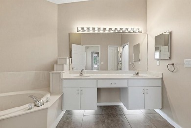 Located within the guard-gated River Hills Golf & Country Club on River Hills Country Club in Florida - for sale on GolfHomes.com, golf home, golf lot