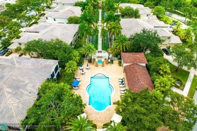 Highly desirable 2-story, coach home in the prestigious Caseras on Parkland Golf Club in Florida - for sale on GolfHomes.com, golf home, golf lot