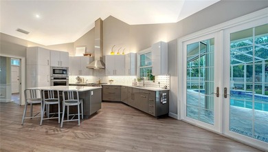 FRESH STYLE....FRESH PRICE!  Behind the gates of The Oaks - on The Oaks Club in Florida - for sale on GolfHomes.com, golf home, golf lot