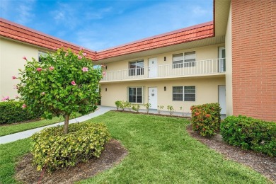 This charming partially furnished 2BR/2BA condo in Vista Royale on The American Golf Club in Florida - for sale on GolfHomes.com, golf home, golf lot