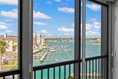 Welcome to LIVING LARGE in PARADISE!! This beautiful CORNER UNIT on Treasure Bay Golf and Tennis in Florida - for sale on GolfHomes.com, golf home, golf lot