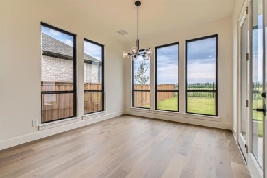Experience luxury living in a picturesque location! This custom on The Tribute At the Colony in Texas - for sale on GolfHomes.com, golf home, golf lot