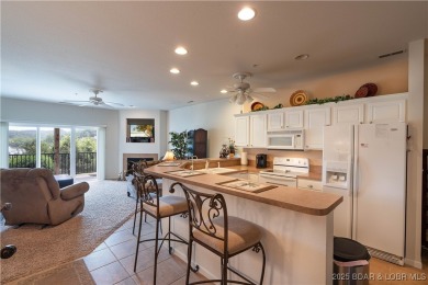 Welcome to your lakefront dream retreat! This immaculate on The Club At Old Kinderhook in Missouri - for sale on GolfHomes.com, golf home, golf lot