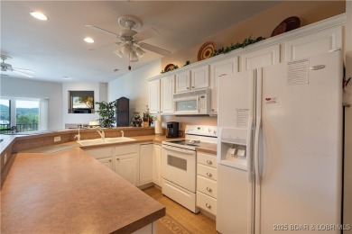 Welcome to your lakefront dream retreat! This immaculate on The Club At Old Kinderhook in Missouri - for sale on GolfHomes.com, golf home, golf lot