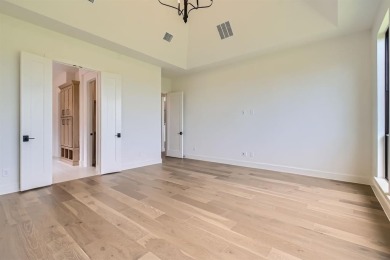 Experience luxury living in a picturesque location! This custom on The Tribute At the Colony in Texas - for sale on GolfHomes.com, golf home, golf lot