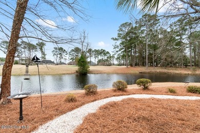 Panoramic water and golf course views set the stage for this on Ocean Ridge Plantation in North Carolina - for sale on GolfHomes.com, golf home, golf lot