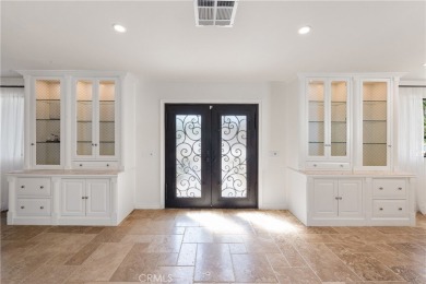 Step into this historic, single-level home in Rancho Mirage on Rancho Las Palmas Country Club in California - for sale on GolfHomes.com, golf home, golf lot