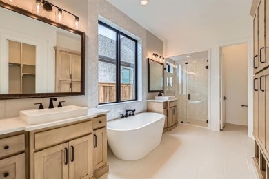 Experience luxury living in a picturesque location! This custom on The Tribute At the Colony in Texas - for sale on GolfHomes.com, golf home, golf lot