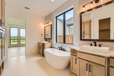 Experience luxury living in a picturesque location! This custom on The Tribute At the Colony in Texas - for sale on GolfHomes.com, golf home, golf lot